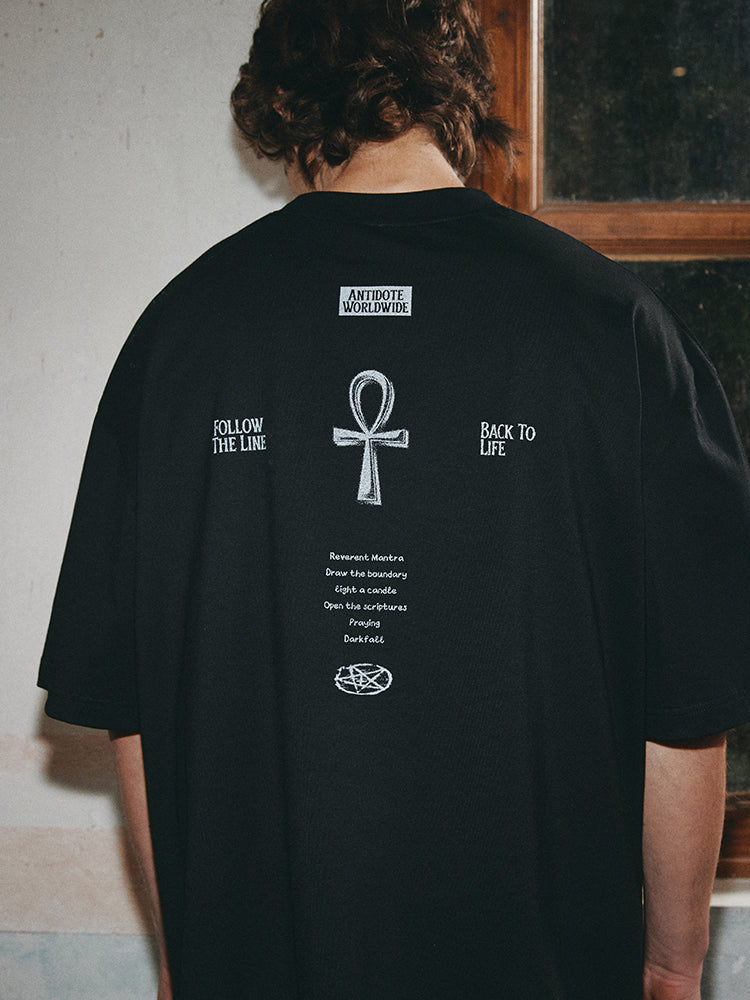 ANTIDOTE Easter Ceremony Printed Cross Letter Tee