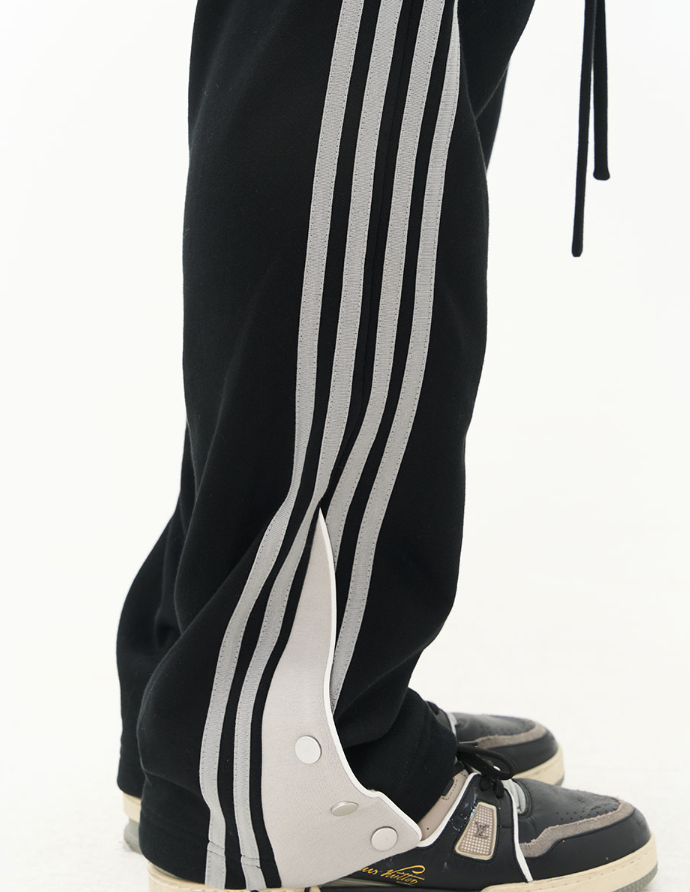 Harsh and Cruel Striped Flared Sweatpants