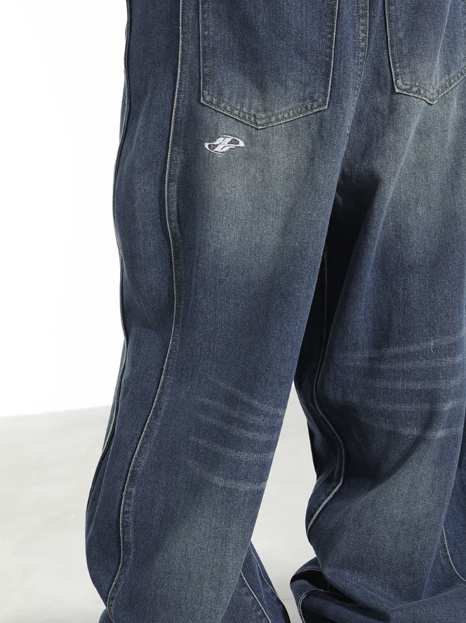 Harsh and Cruel 3D Twisted Wave Logo Distressed Washed Denim Pants