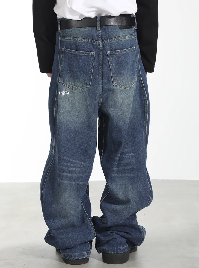 Harsh and Cruel 3D Twisted Wave Logo Distressed Washed Denim Pants