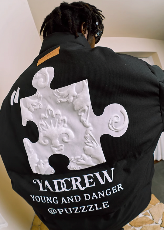 YADcrew Embossed Jigsaw Puzzle Puffer Jacket