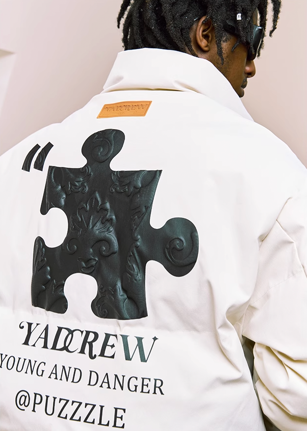 YADcrew Embossed Jigsaw Puzzle Puffer Jacket