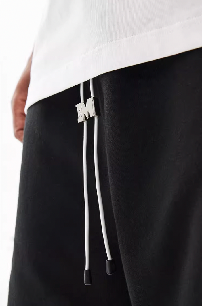 MEDM M Buckle Cut Off Shorts