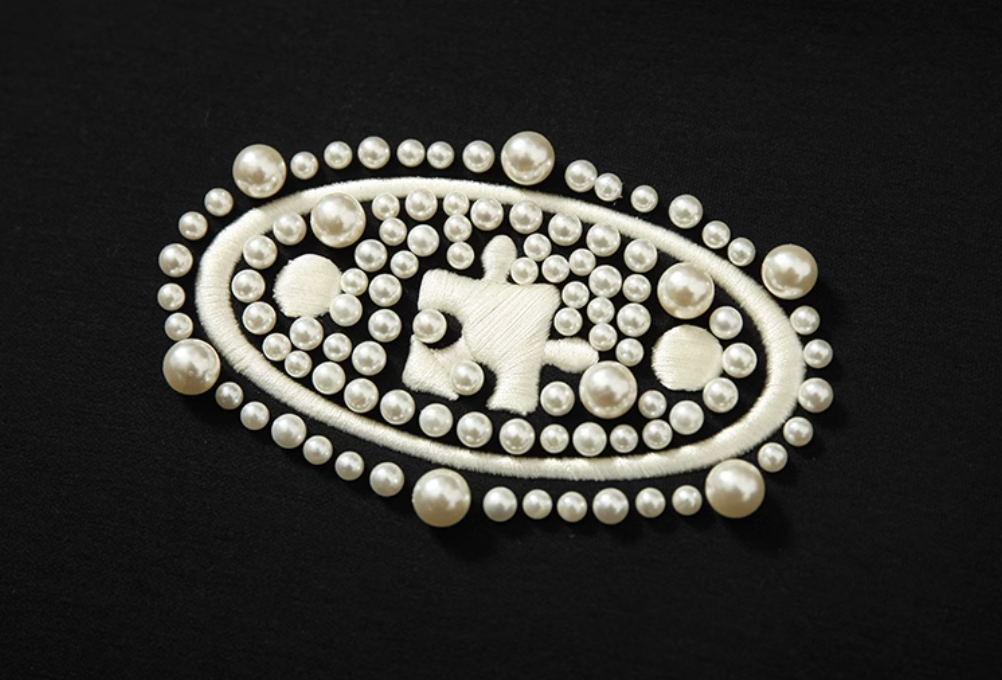 YADcrew Pearl and Embroidered Logo Puzzle Hoodie | Face 3 Face