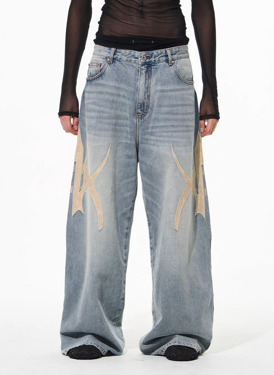 BLIND NO PLAN Graphic Logo Leather-Embroidered Washed Baggy Jeans | Face 3 Face