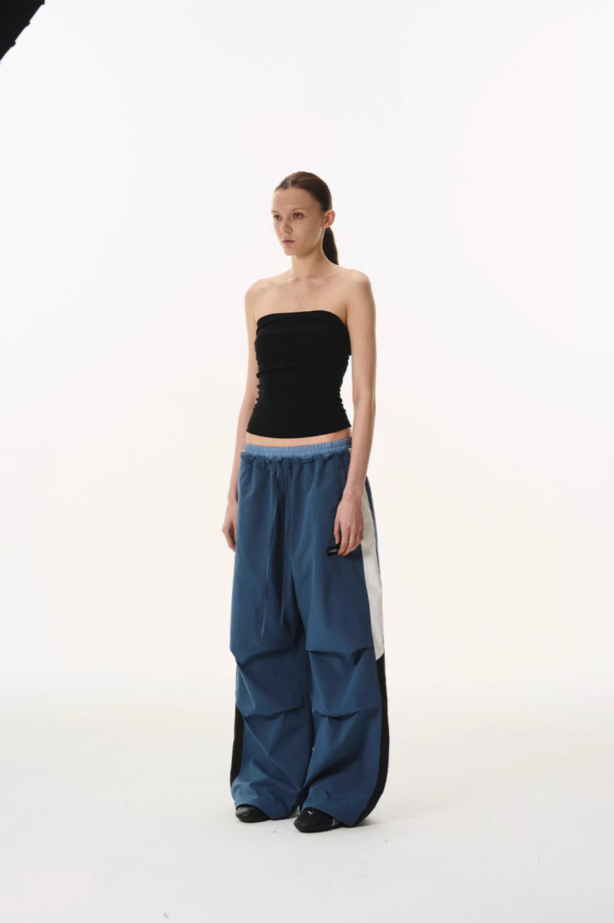 BLIND NO PLAN Double Waist Layered Color Block Pleated Track Pants | Face 3 Face