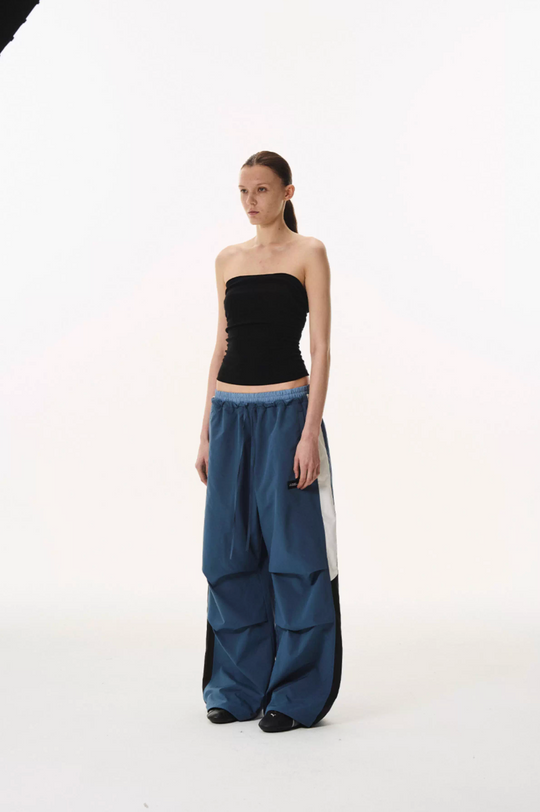 BLIND NO PLAN Double Waist Layered Color Block Pleated Track Pants | Face 3 Face