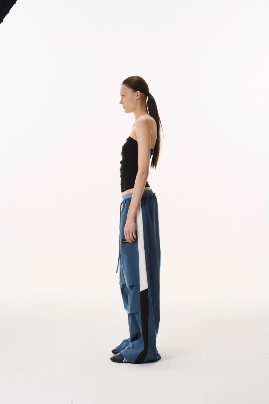 BLIND NO PLAN Double Waist Layered Color Block Pleated Track Pants | Face 3 Face