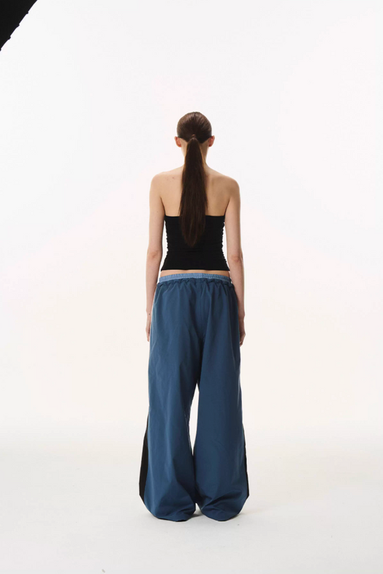 BLIND NO PLAN Double Waist Layered Color Block Pleated Track Pants | Face 3 Face