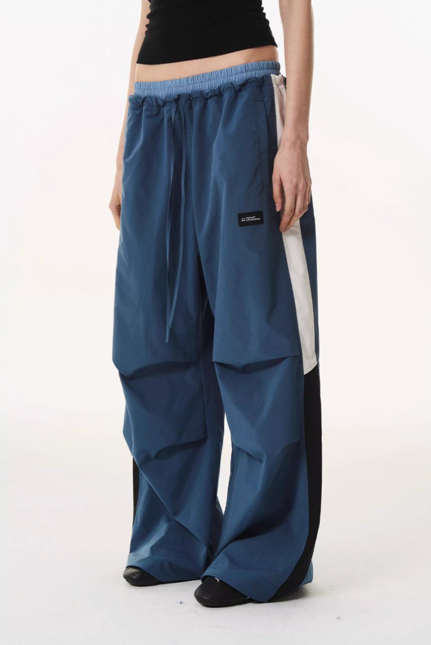 BLIND NO PLAN Double Waist Layered Color Block Pleated Track Pants | Face 3 Face