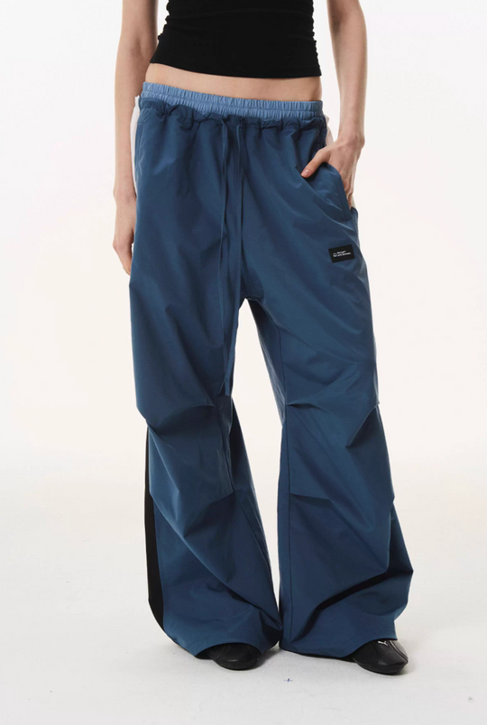 BLIND NO PLAN Double Waist Layered Color Block Pleated Track Pants | Face 3 Face