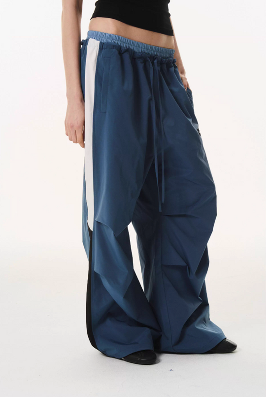 BLIND NO PLAN Double Waist Layered Color Block Pleated Track Pants | Face 3 Face