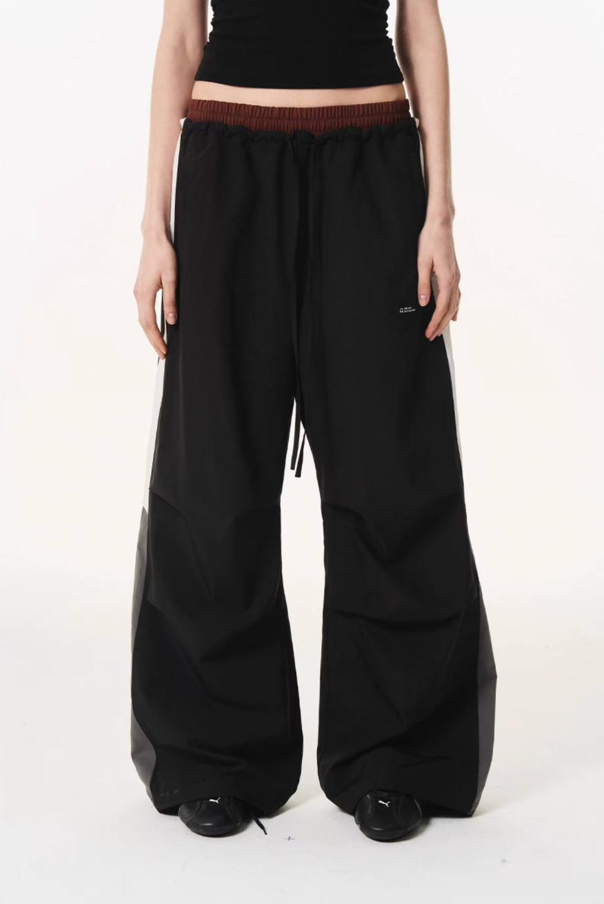 BLIND NO PLAN Double Waist Layered Color Block Pleated Track Pants | Face 3 Face