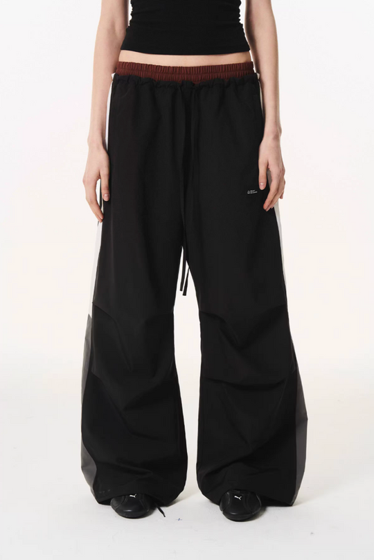 BLIND NO PLAN Double Waist Layered Color Block Pleated Track Pants | Face 3 Face