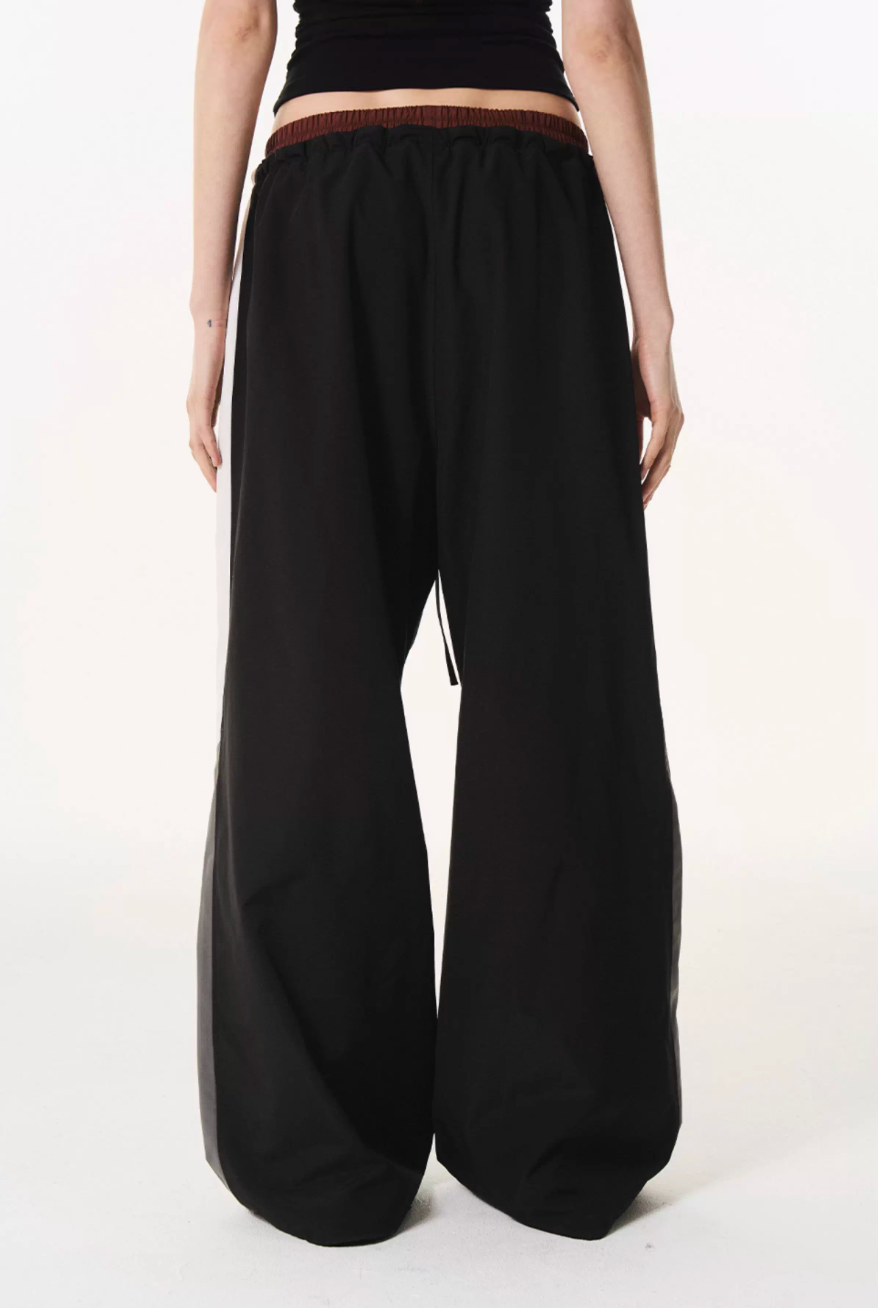 BLIND NO PLAN Double Waist Layered Color Block Pleated Track Pants | Face 3 Face