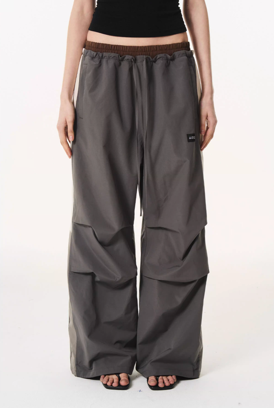 BLIND NO PLAN Double Waist Layered Color Block Pleated Track Pants | Face 3 Face