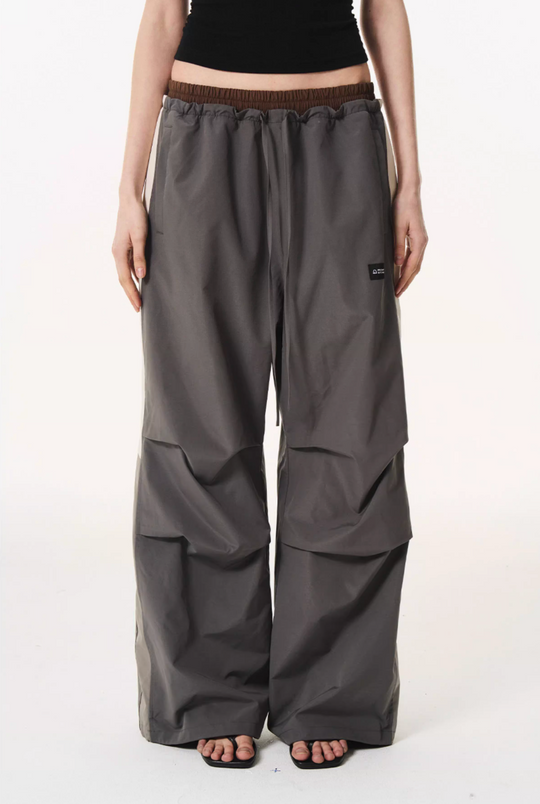 BLIND NO PLAN Double Waist Layered Color Block Pleated Track Pants | Face 3 Face