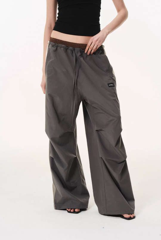 BLIND NO PLAN Double Waist Layered Color Block Pleated Track Pants | Face 3 Face