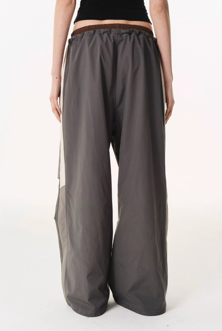 BLIND NO PLAN Double Waist Layered Color Block Pleated Track Pants | Face 3 Face
