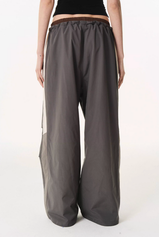 BLIND NO PLAN Double Waist Layered Color Block Pleated Track Pants | Face 3 Face
