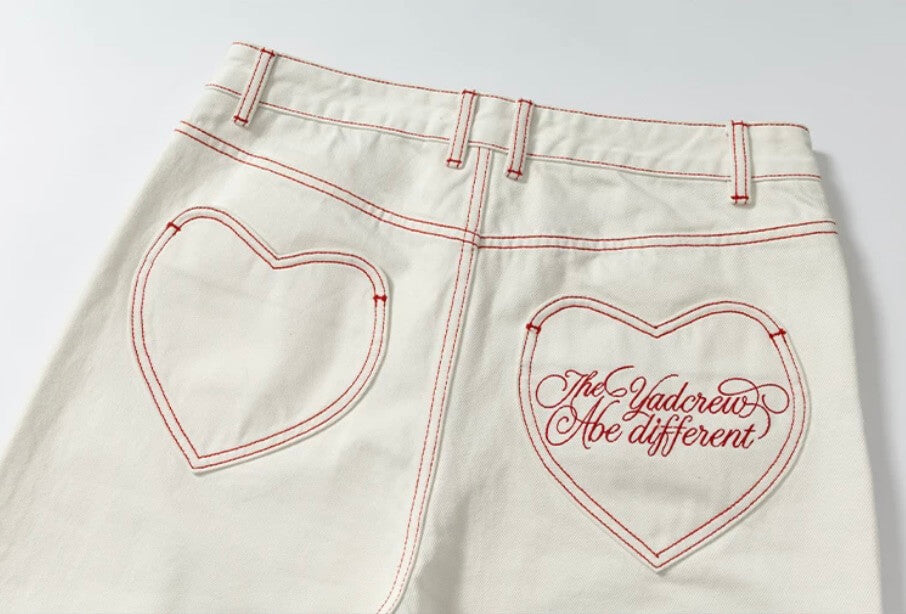 YADcrew Heart Shaped Pocket Slight Flare White Jeans | Face 3 Face