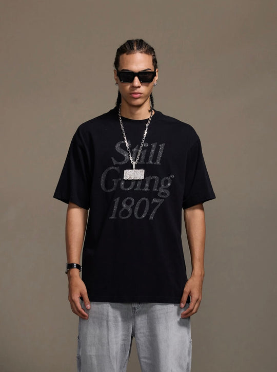1807 Still Going Glitter Print Short Sleeve Tee | Face 3 Face