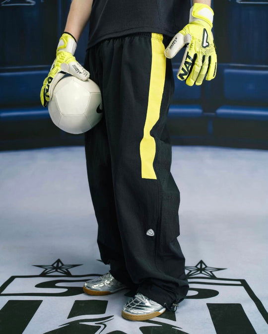 S45 Yellow Color Block Logo Patch Nylon Track Pants | Face 3 Face