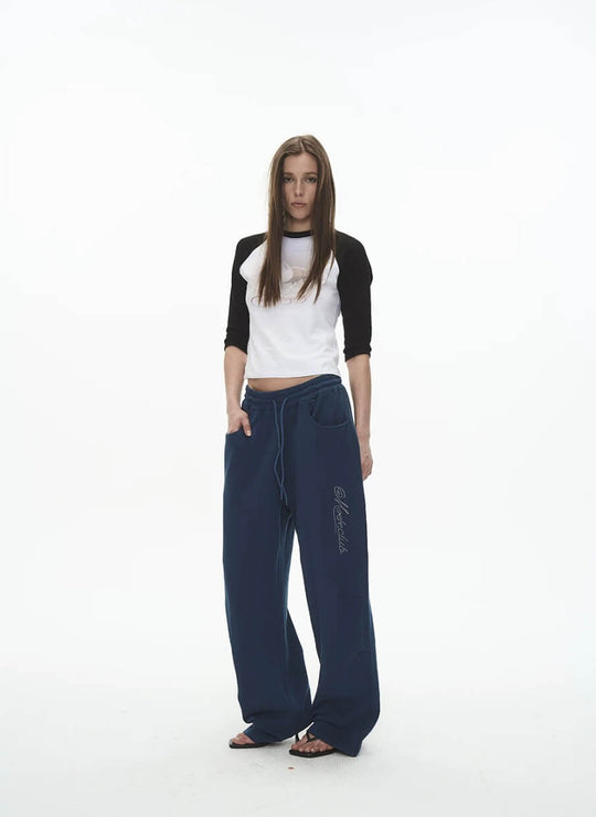 EXITMODE BY BLIND NO PLAN Dot Line Embroidered Baggy Sweatpants | Face 3 Face