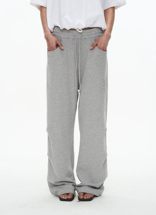 EXITMODE BY BLIND NO PLAN Dot Line Embroidered Baggy Sweatpants | Face 3 Face