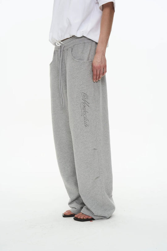EXITMODE BY BLIND NO PLAN Dot Line Embroidered Baggy Sweatpants | Face 3 Face