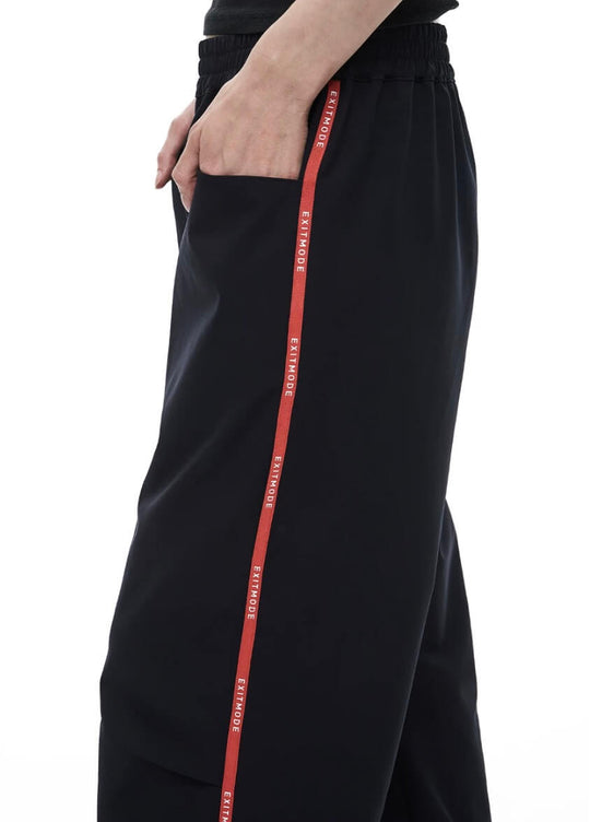 EXITMODE BY BLIND NO PLAN Side Webbing Pleated Track Pants | Face 3 Face