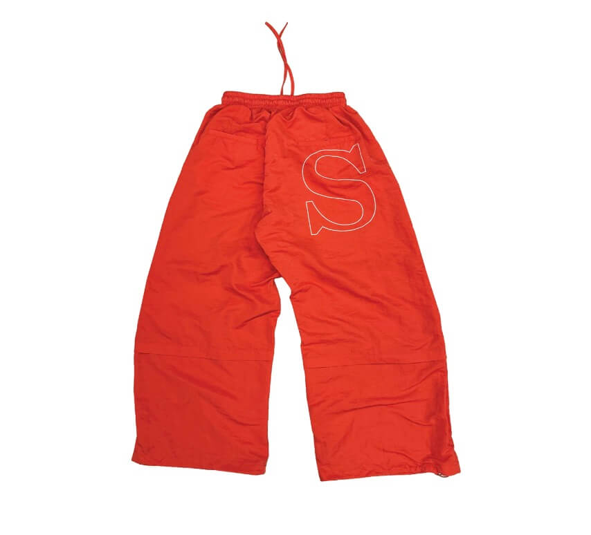 EVETS Orange Logo Print Nylon Baggy Track Pants | Face 3 Face