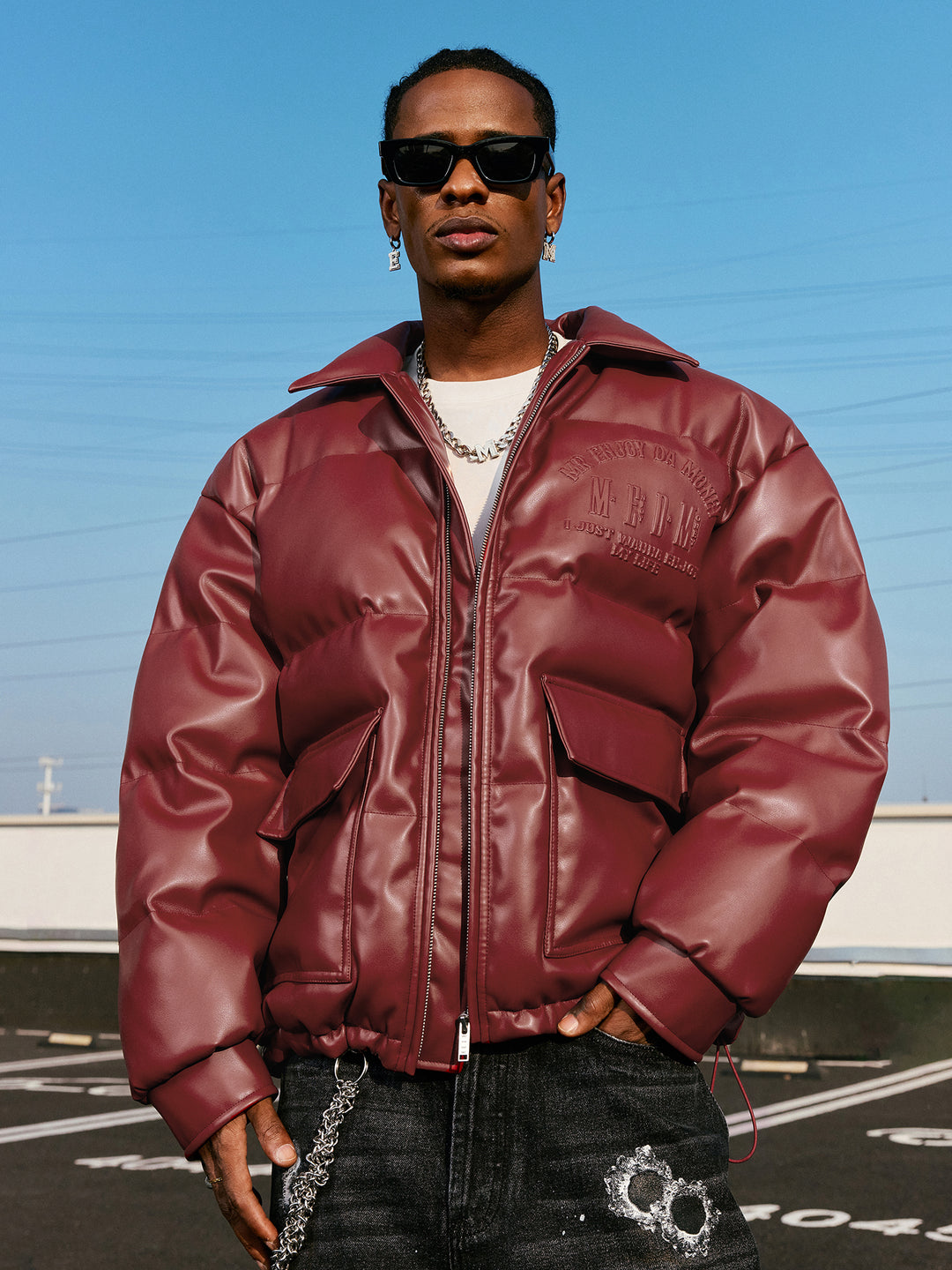 MEDM Embossed LOGO Leather Down Jacket | Face 3 Face