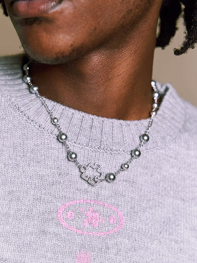 YADcrew Puzzle Pearl Necklace | Face 3 Face