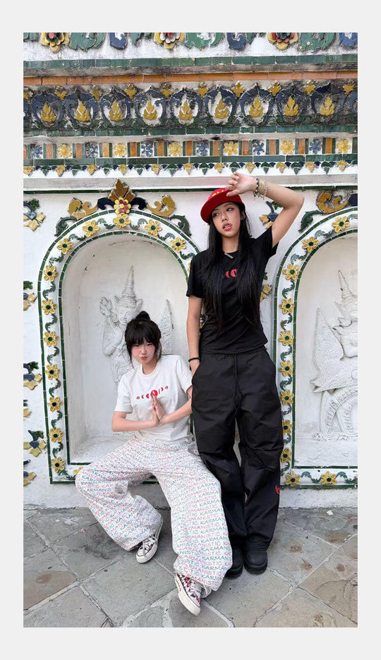 KARMANISTIC All Over Logo Print Baggy Jeans | Face 3 Face