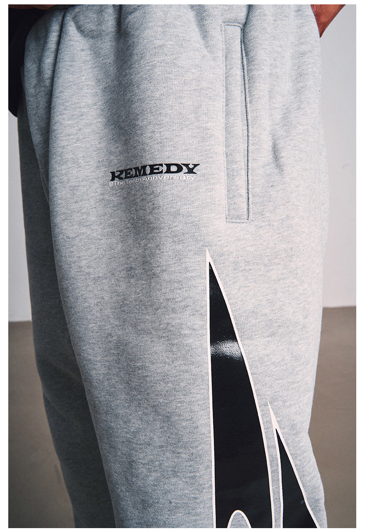 Remedy Swirl R Graphic Sweatpants | Face 3 Face