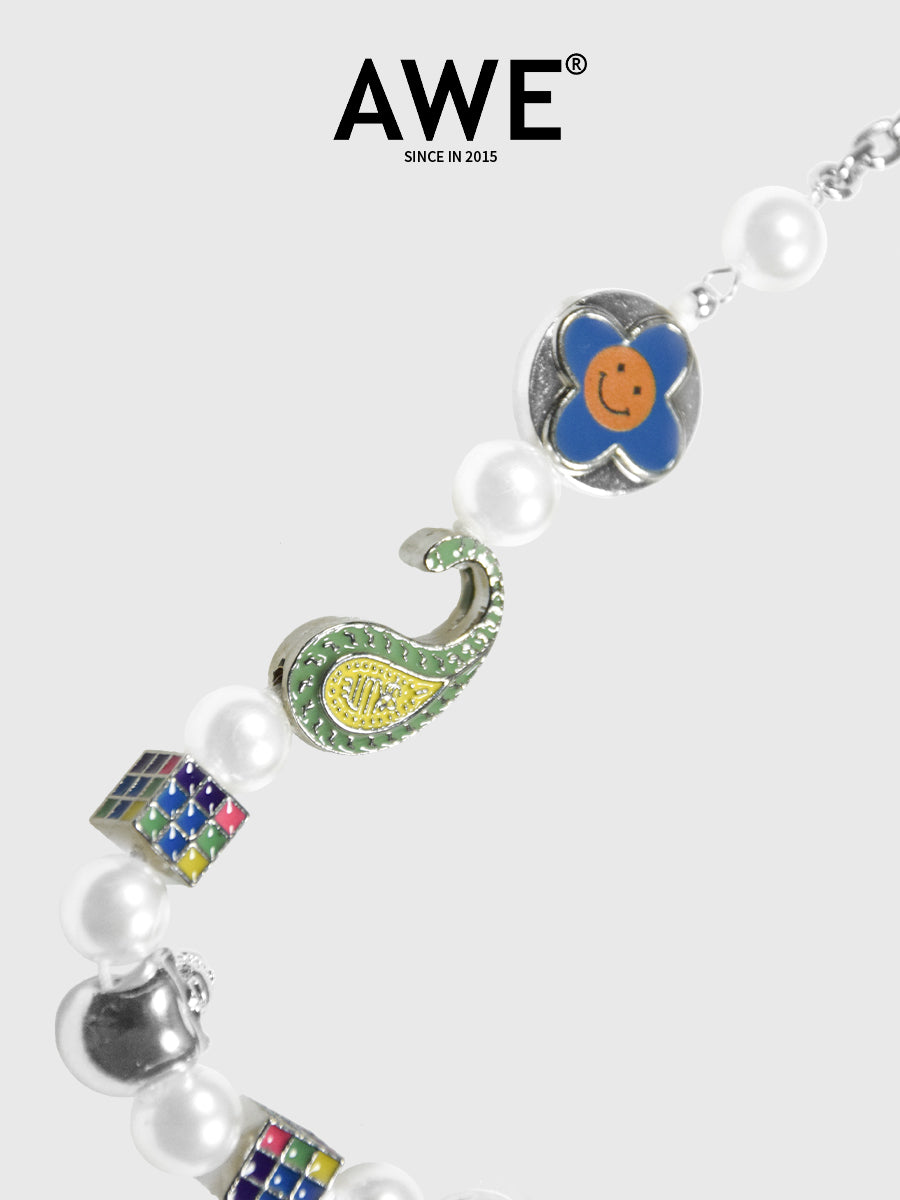 AWE Cross Petal Skull Smiley Face Pearl Necklace | Face 3 Face