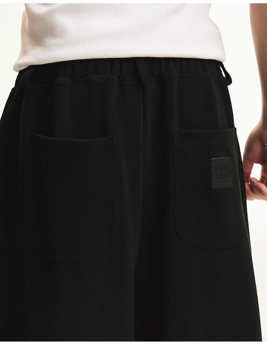 MEDM Curved Metal Tag Baggy Sweatpants | Face 3 Face
