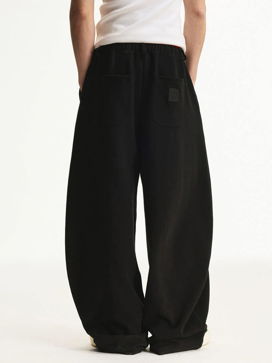 MEDM Curved Metal Tag Baggy Sweatpants | Face 3 Face