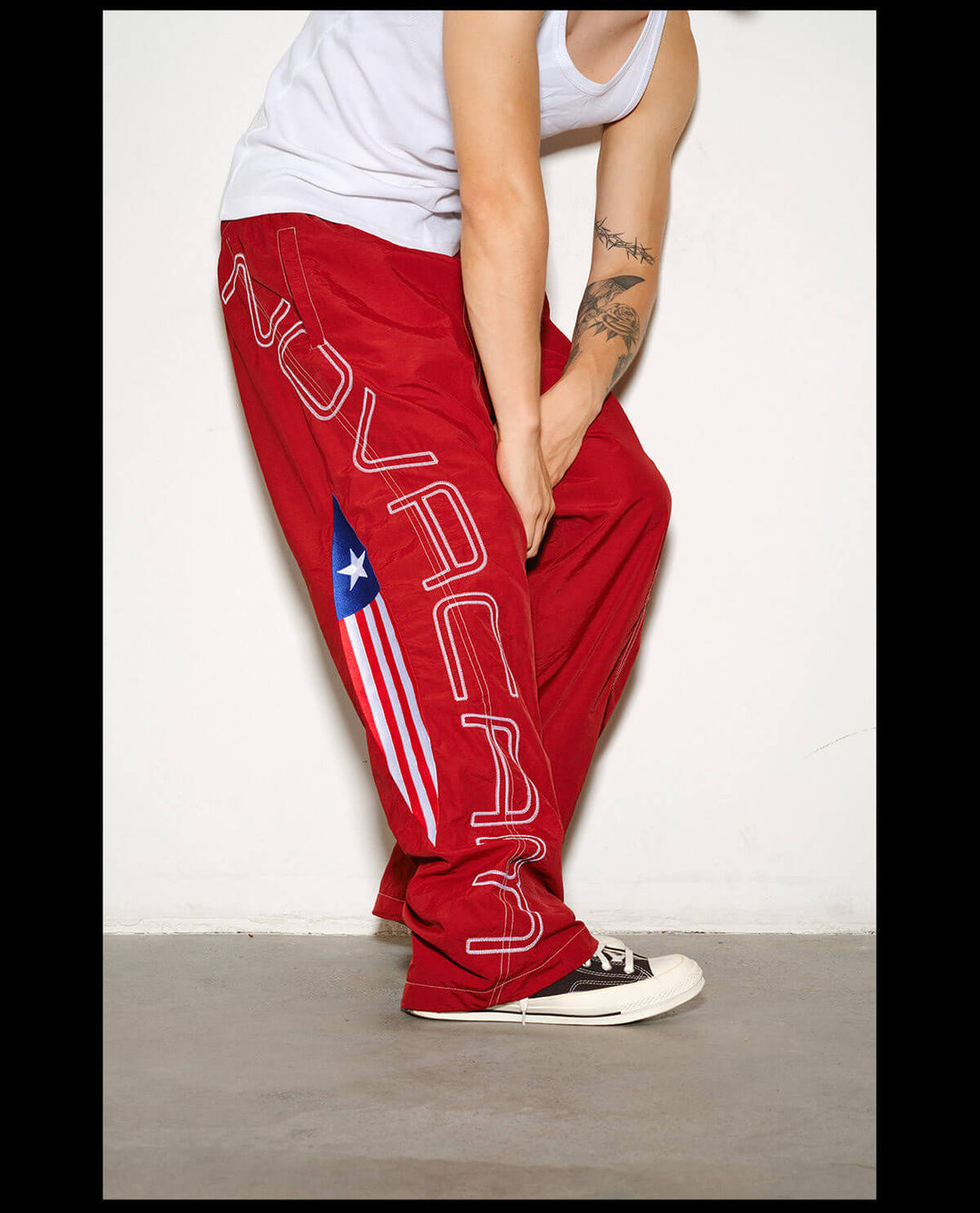 NOVACAM Logo Embroidered Nylon Curved Baggy Track Pants | Face 3 Face