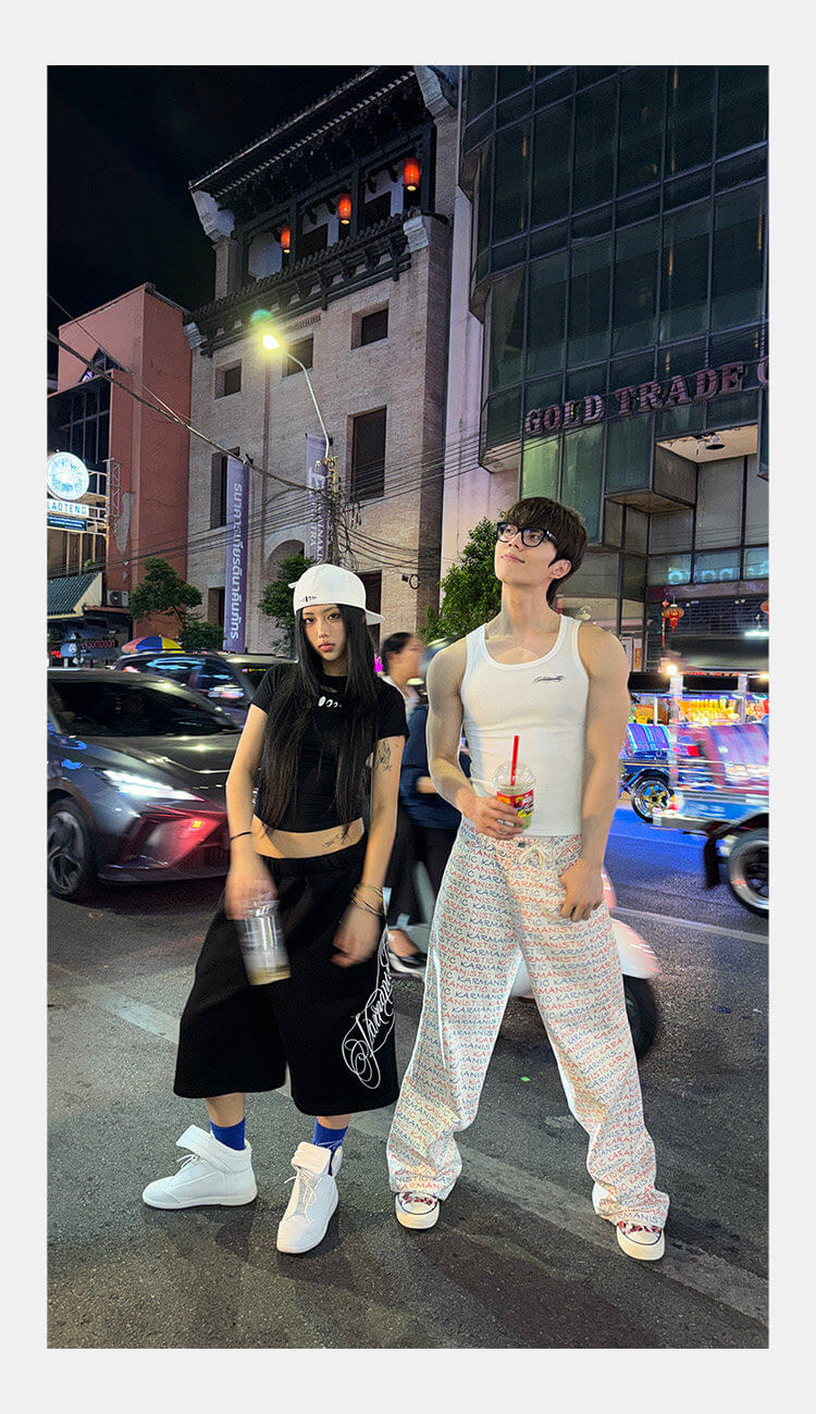 KARMANISTIC All Over Logo Print Baggy Jeans | Face 3 Face