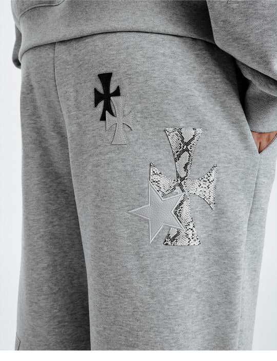 MEDM Leather Cross Star Patchwork Sweatpants | Face 3 Face
