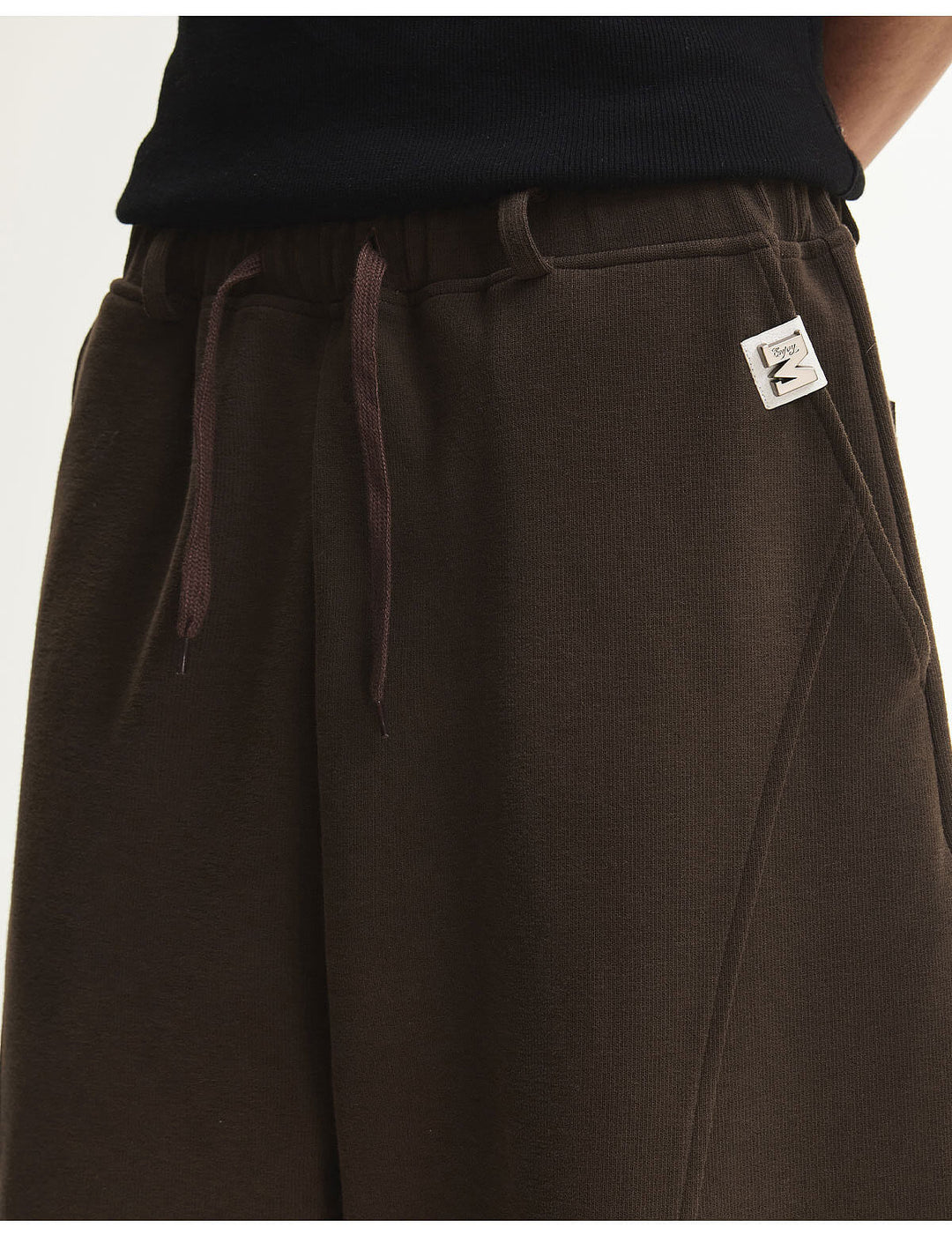 MEDM Curved Metal Tag Baggy Sweatpants | Face 3 Face