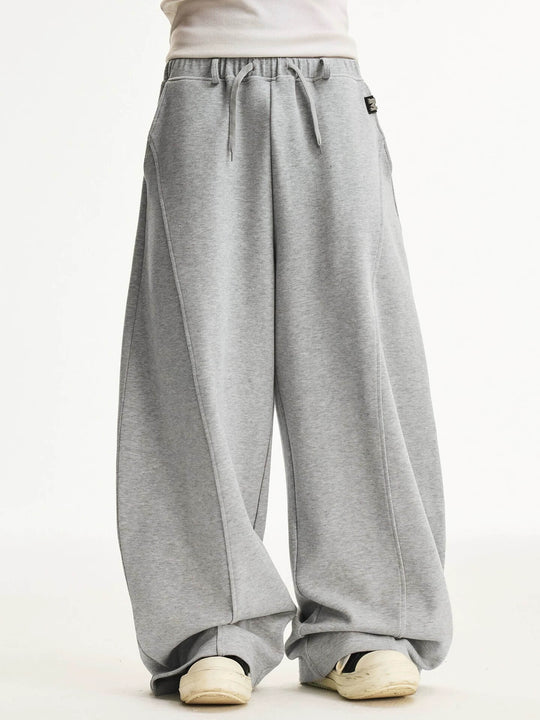 MEDM Curved Metal Tag Baggy Sweatpants | Face 3 Face