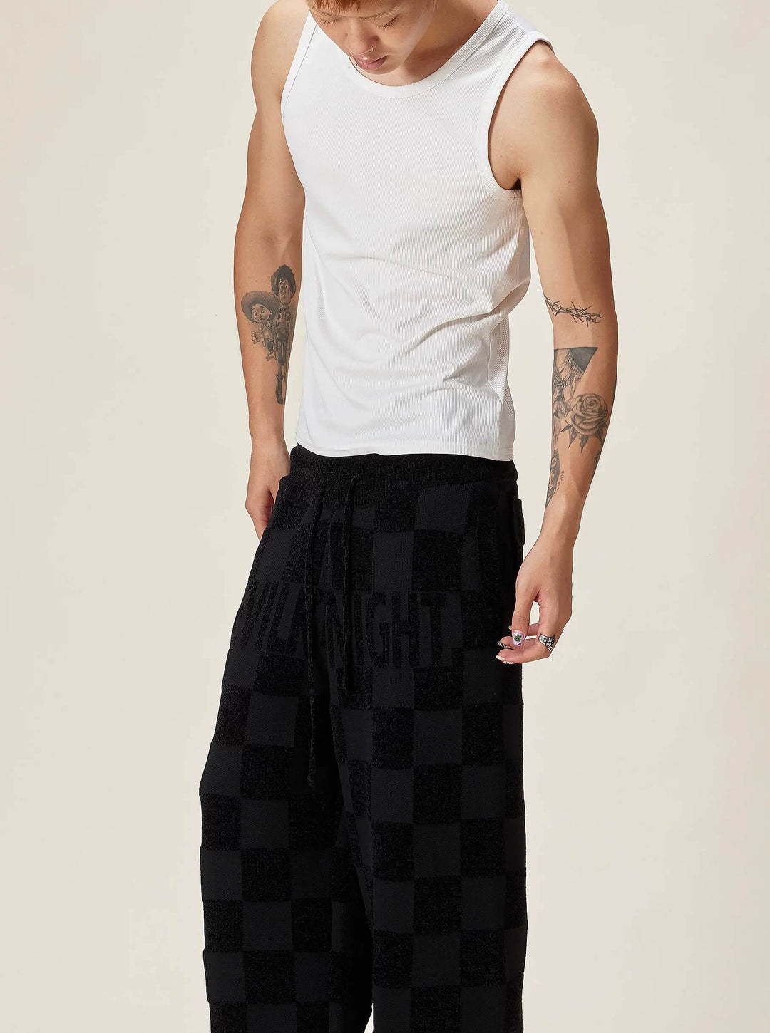 EVILKNIGHT(EK) Jacquard Logo Plaid Knit Pants | Face 3 Face