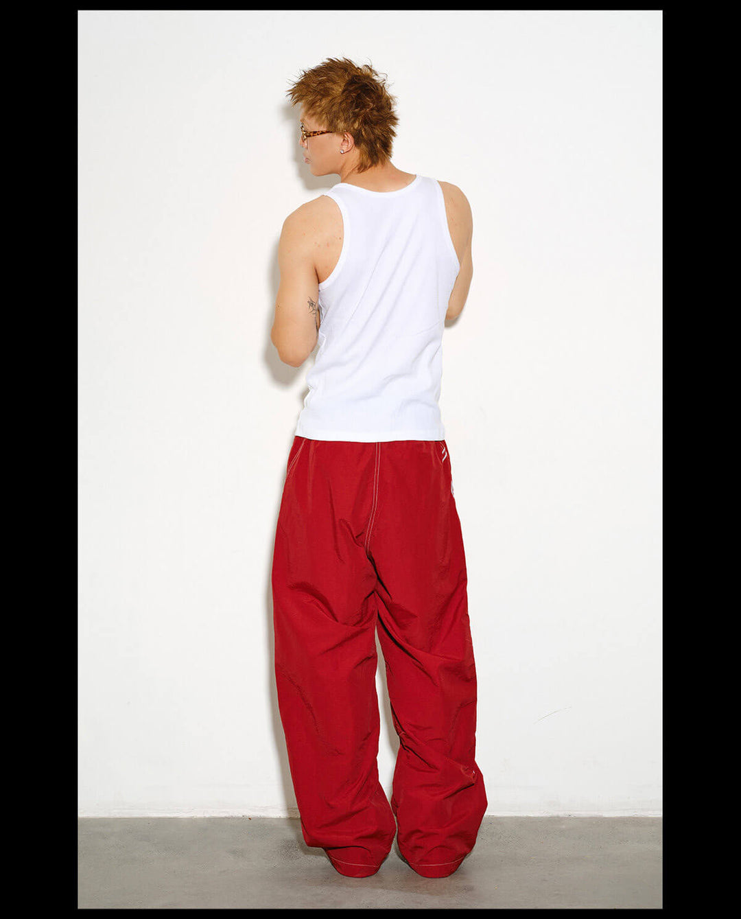 NOVACAM Logo Embroidered Nylon Curved Baggy Track Pants | Face 3 Face
