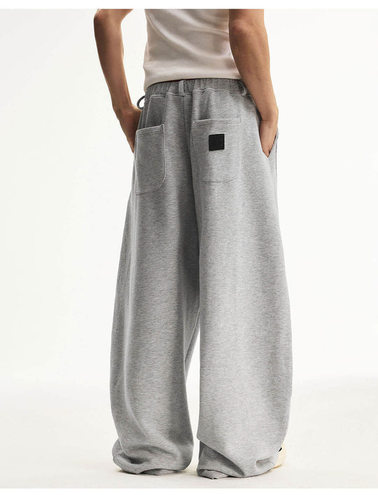 MEDM Curved Metal Tag Baggy Sweatpants | Face 3 Face