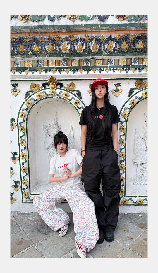 KARMANISTIC All Over Logo Print Baggy Jeans | Face 3 Face