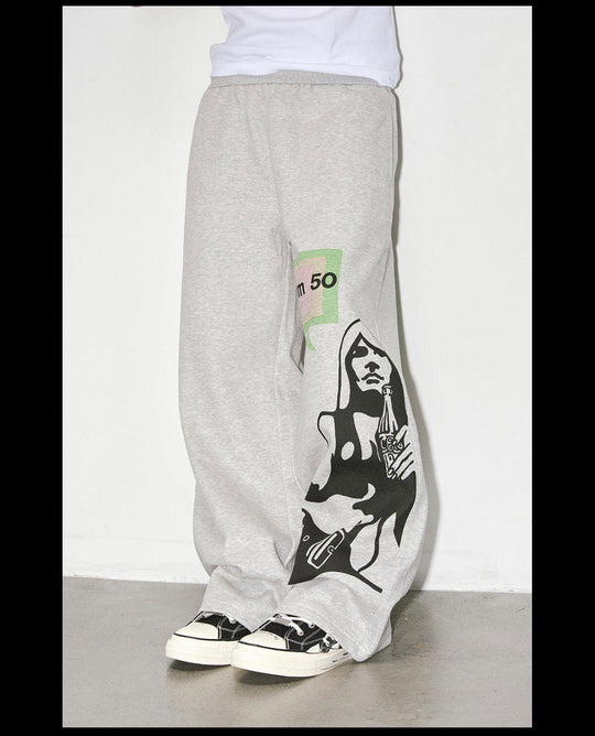 NOVACAM Portrait Graphic Print Curved Baggy Sweatpants | Face 3 Face