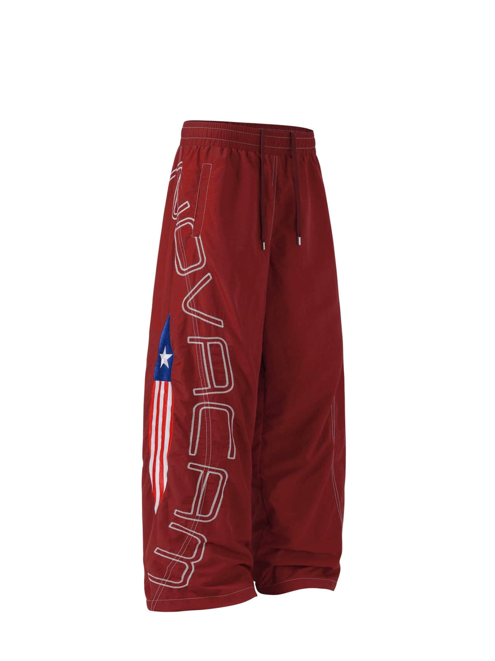 NOVACAM Logo Embroidered Nylon Curved Baggy Track Pants | Face 3 Face